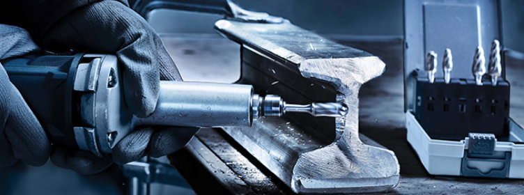 Component-deburring-removing-burr-with-carbide-burr-on-machined-part