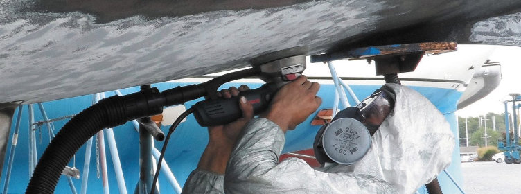 Prep-sanding-boat-hull-ready-for-painting