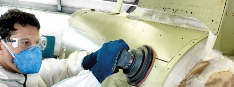 Sanding-aeroplane-aluminium-panel-with-sander